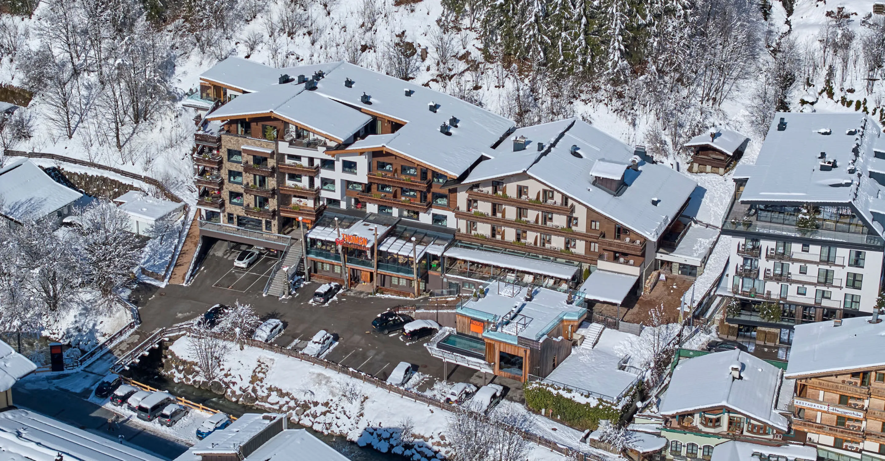 Aerial view of a hotel in a snowy landscape